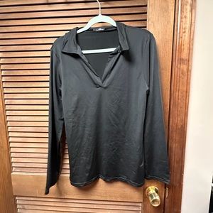Black long sleeve top.